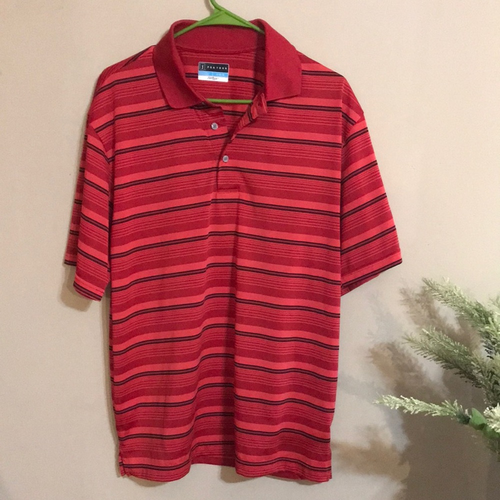 PGA Tour golf shirt.